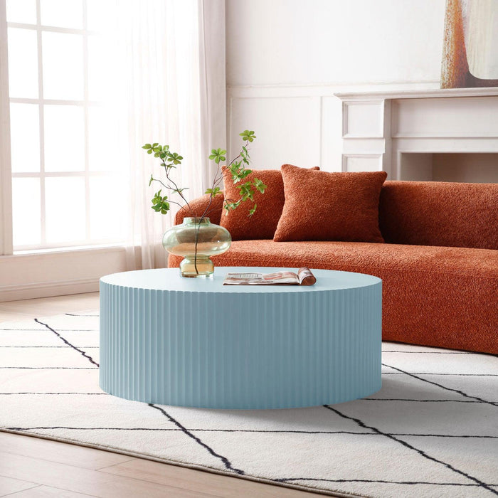 Handcrafted Round Coffee Table End table with Elegant Relief Detailing, Light Blue